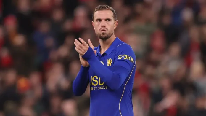 Jordan Henderson in a Chelsea shirt applauding the crowd at Anfield